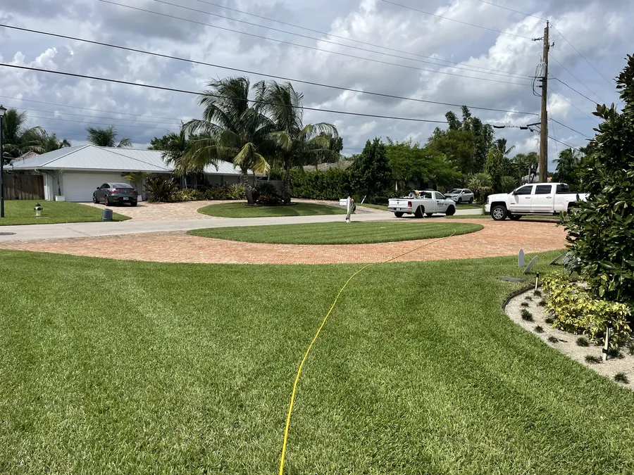 Large lawn with a circular driveway